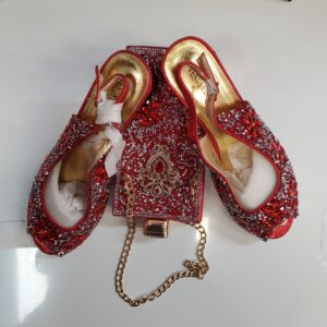 Red beaded clutch and shoes