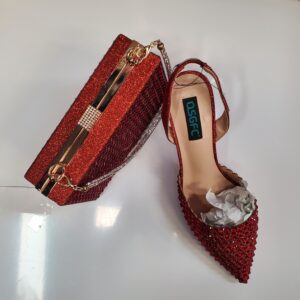 Red heels and clutch
